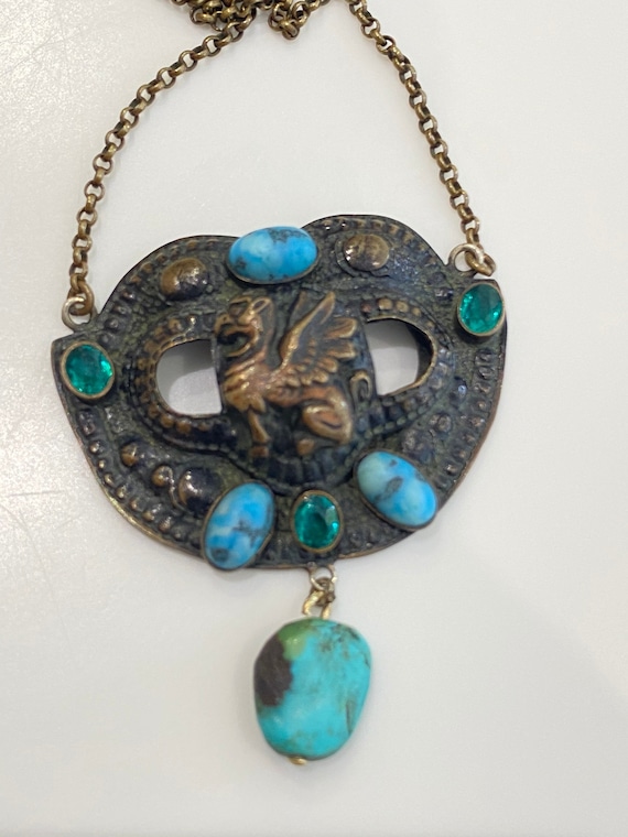 Striking and Unusual hand made Arts and crafts pendant necklace hammered brass with bezel set turquoise stones