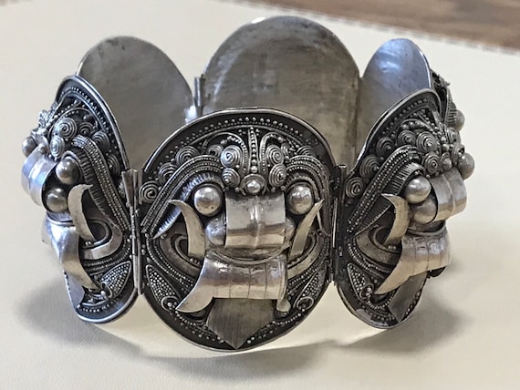 Balinese Silver filigree Hindu Tribal bracelet depicting the Child Eating Demon Rangda