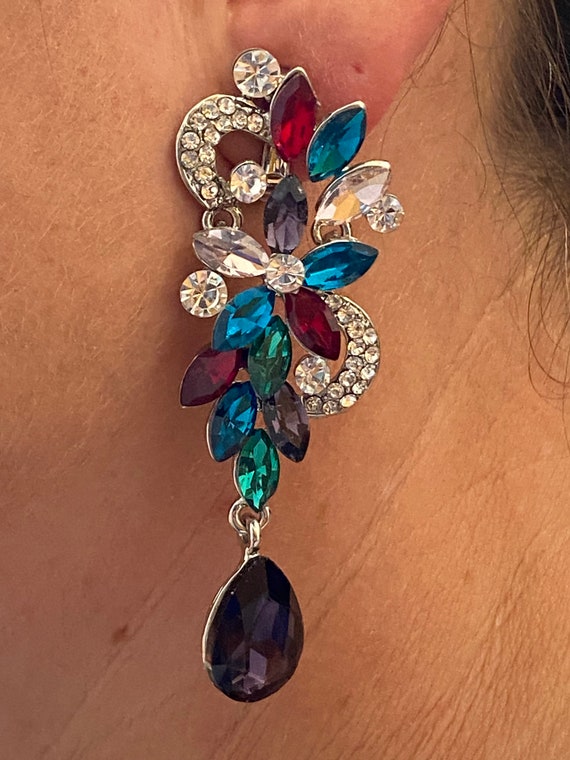 Striking oversized flamboyant crystal rhinestone clip on earrings statement piece