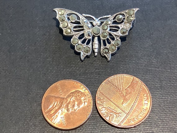 Pretty vintage silver toned metal and marcasite butterfly brooch pin