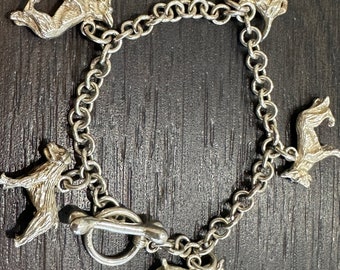 Lovely solid 925 silver circle link charm bracelet with 5 silver dog charms and bone shaped toggle fastener