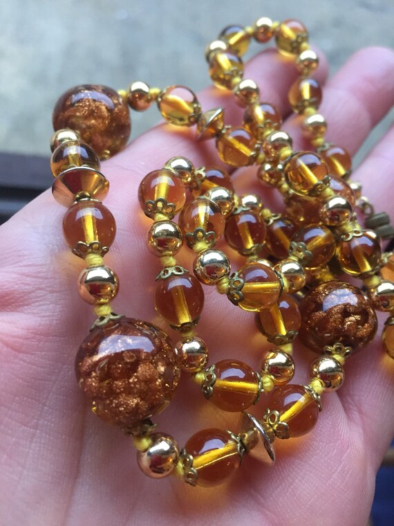A striking gold flecked vintage Venetian twisted glass necklace