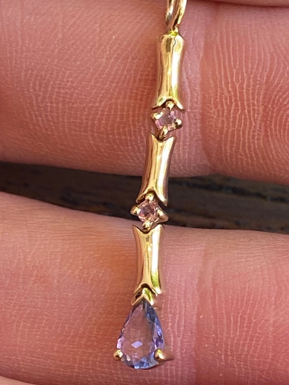 Long 9ct 375 gold and Amethyst hinged pendant