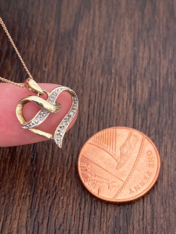 solid delicate 9ct 375 yellow gold and diamond heart pendant on a 19 inch gold chain necklace
