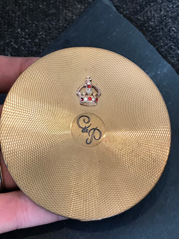 AGME Swiss Made vintage gold tone powder compact with jewelled crown monogrammed logo Vintage compact powder vanity mirror