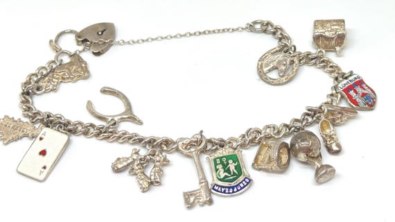 Vintage Sterling Silver Charm Bracelet: 13 assorted Mixed and unusual charms