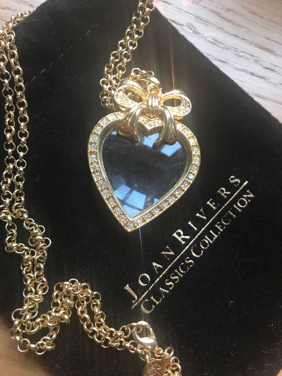 Beautiful Vintage gold plated crystal magnifying heart necklace by Joan Rivers.