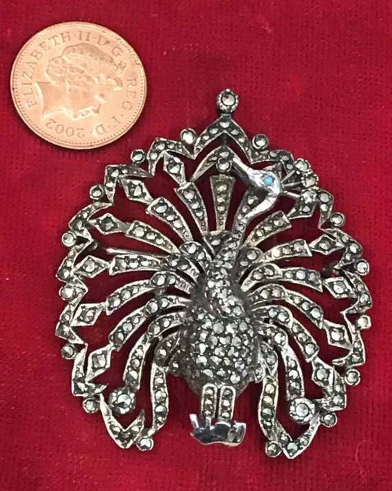 Beautiful vintage solid silver peacock pendant brooch set with Marcasites and marked silver