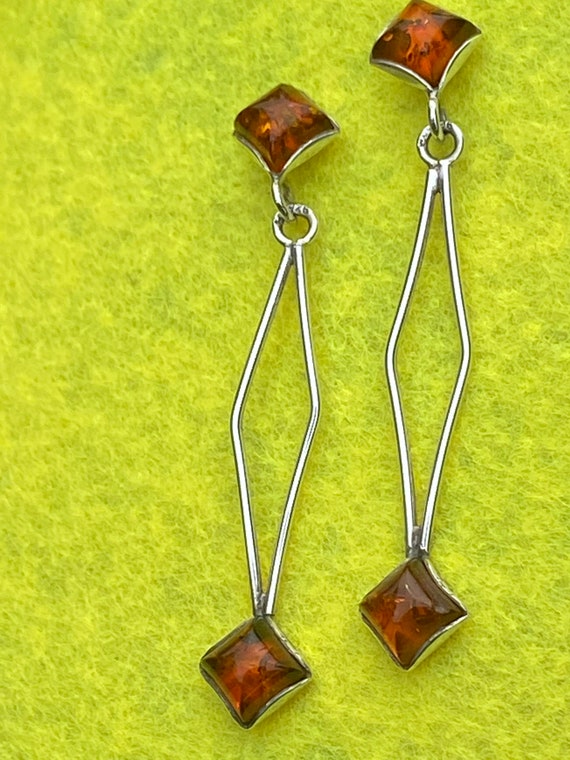 Long vintage modernist style  silver and honey baltic amber drop earrings