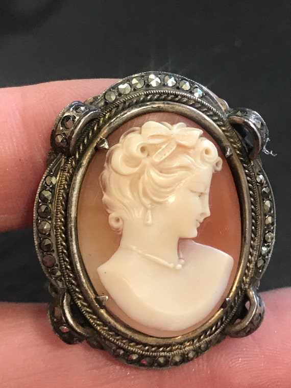 Sterling Silver (800) framed carved shell cameo pin pendant brooch adorned with Marcasites