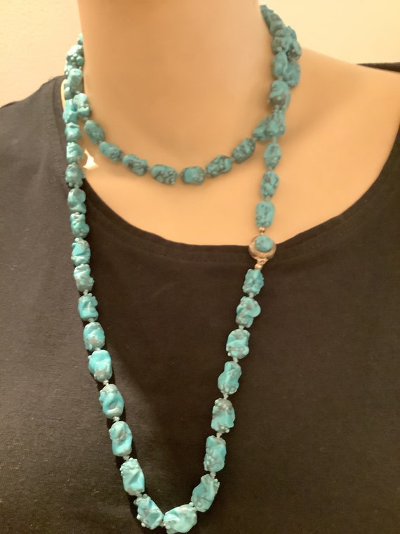 Striking Vintage hand knotted Long turquoise glass nugget beaded Necklace With Round clasp 42” inches in length.