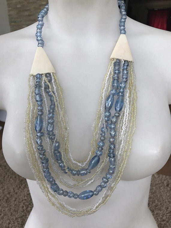 on trend 1980s  multi stranded Statement piece cool vibes summer blue toned shades  boho necklace