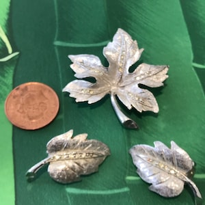 Set of 1950s Vintage Designer Charel brushed silver toned metal brooch and clip earrings