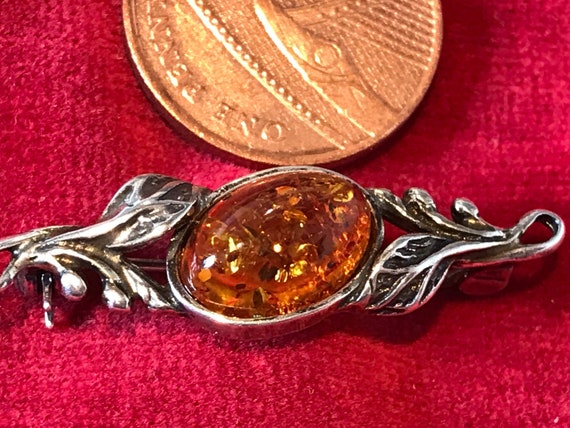 Vintage solid silver and Baltic honey Amber brooch/ Pin.
