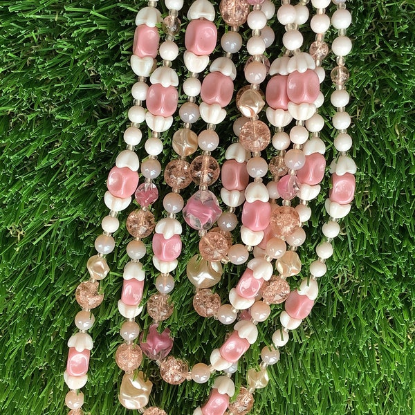 A vintage Multi stranded pretty Pink toned layered glass beaded necklace