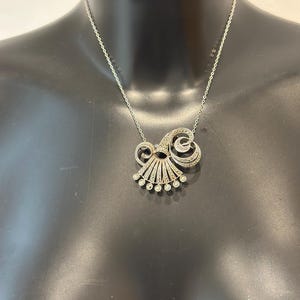 Beautiful vintage solid silver pendant brooch set with Marcasites on a silver chain