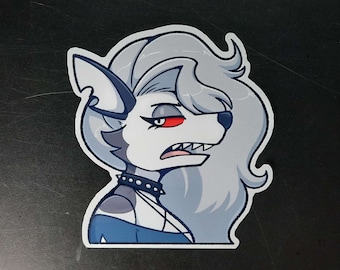 May include: A sticker featuring a cartoon character with wolf-like features. The character has gray fur, red eyes, and a black studded collar. The character's expression is one of annoyance or anger, with its mouth open and teeth bared.