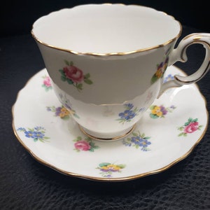 Vtg Staffordshire Fine Bone China Tiny roses pansies Cup and saucer with GOLD Trim Made in England