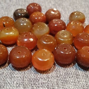 Vintage 23 faceted carnelian stone beads