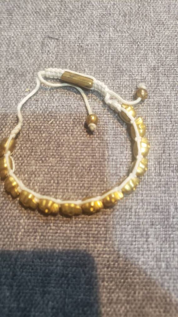 Vintage Bohemian gold metal skull beads and macram