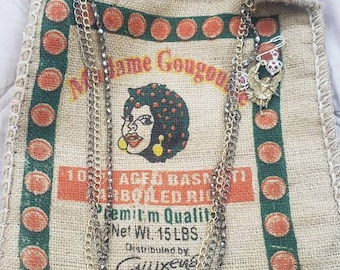 Altered Basmati rice bag Madame Gougousse with multi chain strap and balangandan brooch