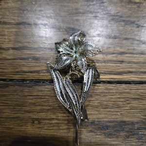 Antique sterling silver 800  filigree flower brooch