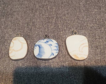 Vintage chinese pottery shard and silver color metal pendants