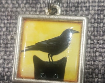Vintage black cat with black bird silver tone pendant