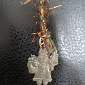Vintage Pewter Santa Claus with handmade colorful yarn strap Christmas  ornament