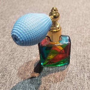 Vintage 2 perfume glass bottles of colorful Murano one with atomizer