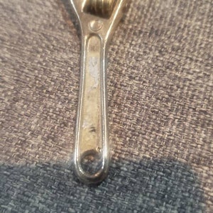 Vintage mini silver wrench pendant