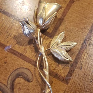 Vintage gold tone metal Rose stem Brooch