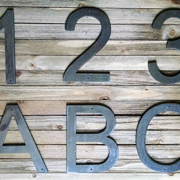 1/16" Thick Metal Letters and Numbers - Arial Bold - Powder Coated Black or Unpainted - With Mounting Holes - Multiple Sizes