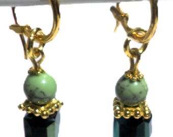 Gold-colored earrings, handmade charms made of cube beads and semi-precious stones in white, pink, green, blue, red. Ibiza hoop earrings