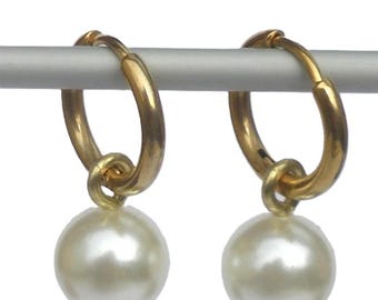 Gold-colored hoop earrings with resin pearl. Hoop earrings with off-white faux pearl, add-on charms. Ibiza hoop earrings, Per Elle jewelry