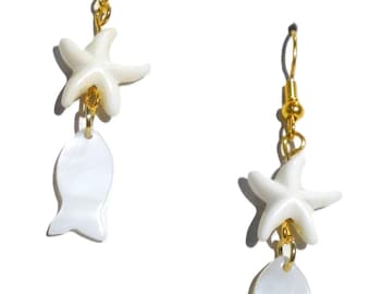 Gold-tone earrings with a starfish and shell charm. Ear hooks with handcrafted white shell charm, fish or oval disc, dangle earring Per Elle