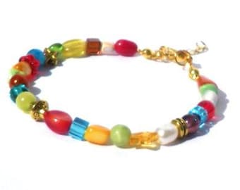 Multicolor bracelet with beads of gemstone, fresh water pearl, shell, tiger eye, glass, evil eye. Handcrafted wristlet, boho chic Ibiza