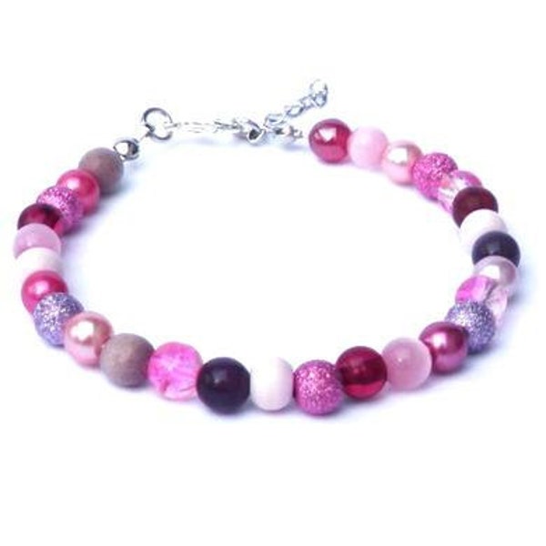 Armband met roze en paarse ronde kralen. Polsband handgemaakt, boho chic, Ibiza strand armsieraad, tijgeroog, glasparel, glaskraal, hout