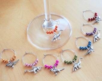 Set of 8 decorative wine glass identifiers,  dinosaur charm (tyrannosaurus, brachiosaurus). Glass markers, metal ring, wine accessory, t-rex