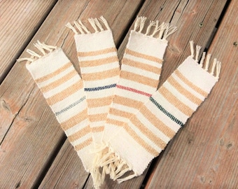 Bookmark woven on a traditional loom in natural colors with a custom touch of red, green, blue or gray.