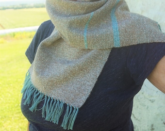 Handwoven scarf on a traditional loom. Turquoise and beige color. Made of wool and acrylic, soft and warm.
