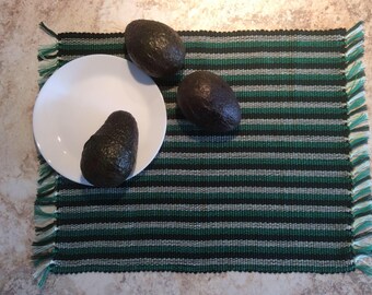 Set of 6 handwoven rectangular placemats, shades of green . Weaving with fringes and stripes. Set of table for lunch, home decoration