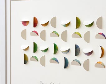 May include: A framed wall art piece featuring a grid of three-dimensional paper semi-circles with colorful interiors. Below the grid, the text reads I am my beloved's and my beloved is mine, followed by a long paragraph of English and Hebrew text.
