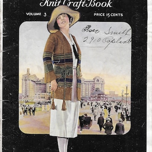 May include: Vintage "Wonoco Knit Craft Book" cover. The cover features a woman in a hat and a knitted jacket with striped sleeves. The background shows a seaside scene with people and buildings. The book's title and volume number are displayed.