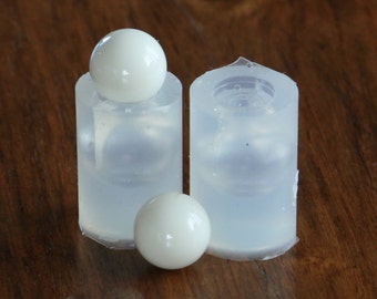 A transparent silicone mold for jewellery DIY,  2 pieces a sphere of 10 mm diameter.