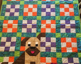 Baby/Toddler Quilt with a puppy dog on it.