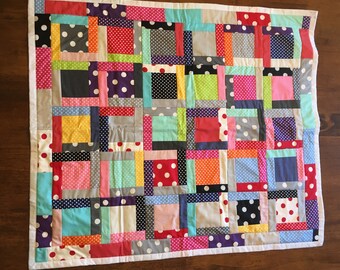 Polk-a-dot patchwork baby quilt