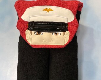 Hooded Towel with an embroidered character on it.