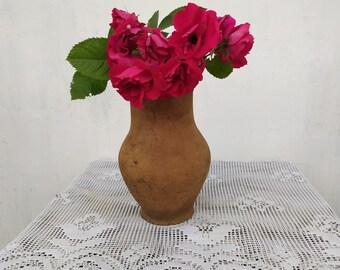 Old antique ancient clay vessel vase without handle. Brown clay pot. Rustic bowl. Primitive decor. Country decor