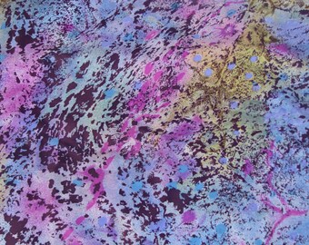 May include: Abstract fabric with a colorful, splatter-painted design. The fabric features shades of purple, pink, blue, and yellow.